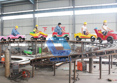 China Passeios da canela das crianças elétricas do aluguer da montanha russa do parque temático da forma mini fábrica